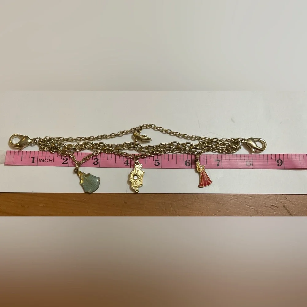 Kids charms bracelet Cinderella and Aurora, shoe and crown 8 1/2 inch bracelet